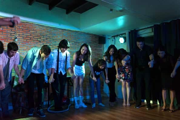 Cinematic Bangkok film set with actors in a dramatic moment, showcasing film energy.