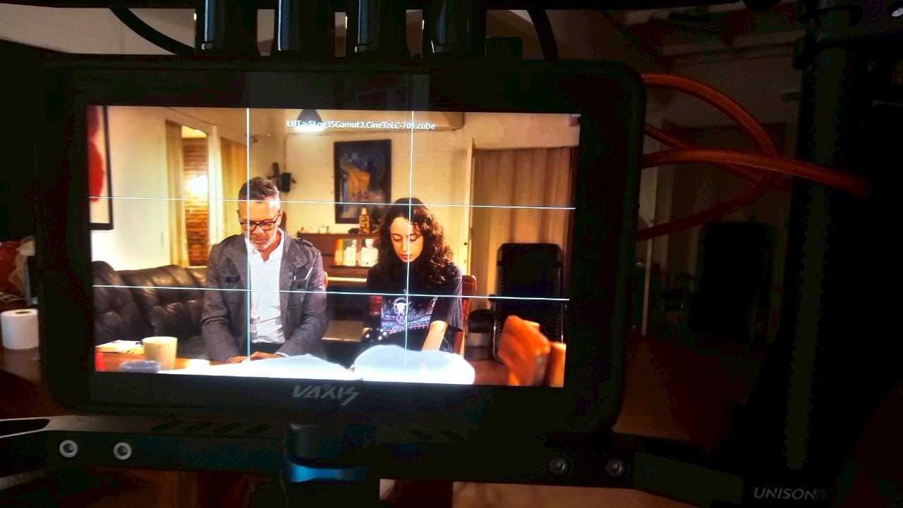 Thailand film set with a lead actor in a dramatic scene, showcasing cinematic talent.