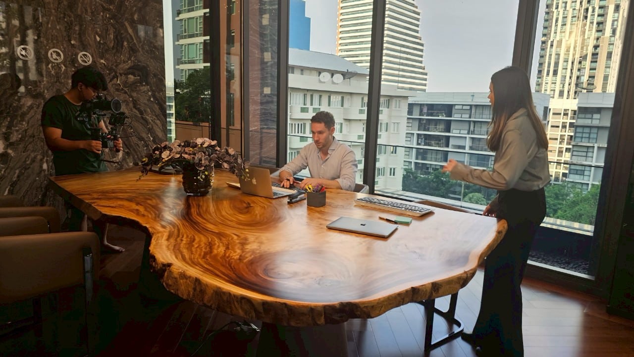 Professional model posing confidently on a Thailand set, highlighting talent.