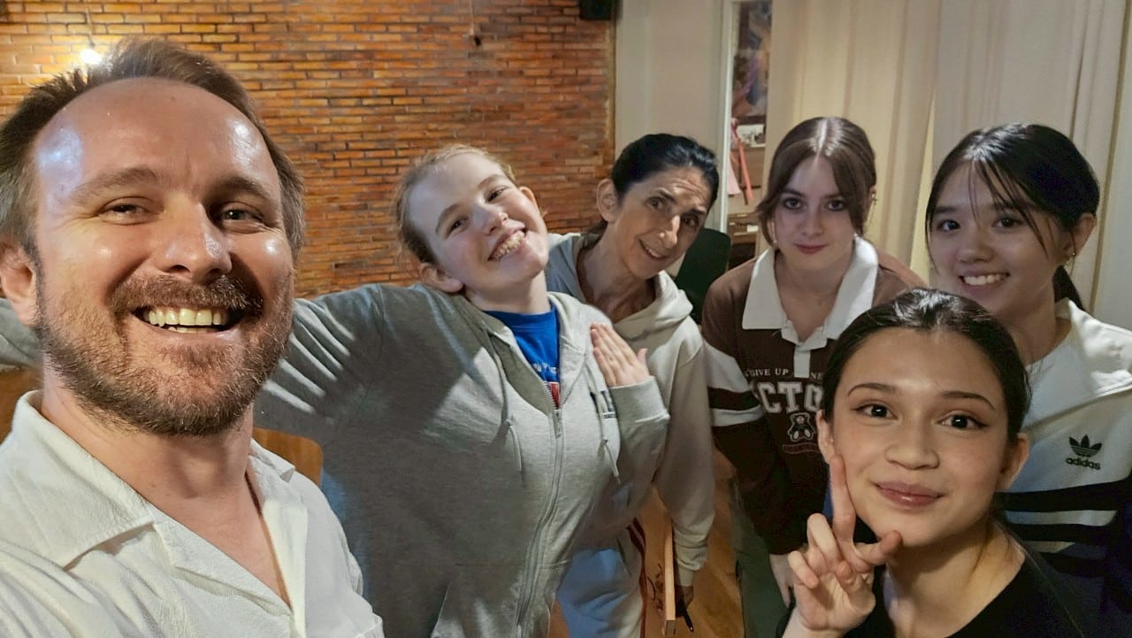 Thailand commercial set with models filming a vibrant ad, showcasing campaign energy.